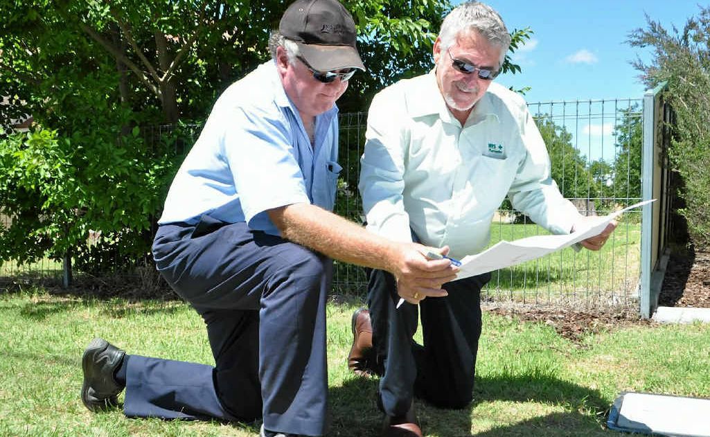 Warwick Friendly Society’s Gavin Egan talks through plans with local builder Doug Roulston outside the block next to the medical centre. Warwick Friendly Society’s Gavin Egan talks through plans with local builder Doug Roulston outside the block next to the medical centre.